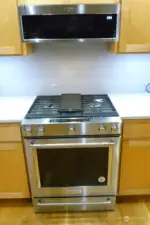 SS kitchen stove and whirlpool Microwave