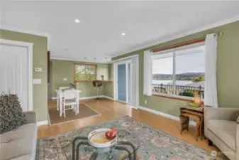 Lovely views and a spacious view deck.  No wall-to-wall carpet here!  Full hardwood floors throughout.