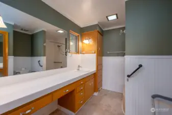 The primary bedroom features lots of countertop space.