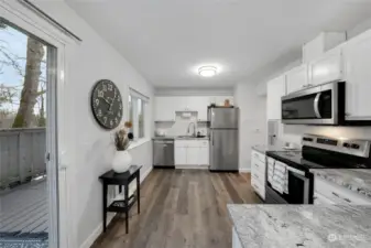 The Kitchen has had upgrades with granite counter tops, LVP flooring, and stainless-steel appliances.