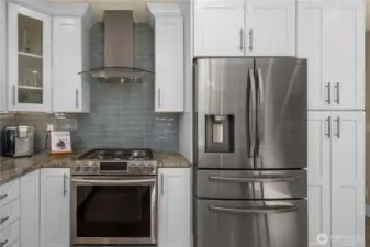 Stainless steel appliances and gas range stay!