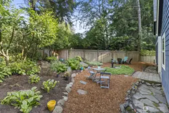 Low-maintenance backyard retreat—natural, private, and peaceful