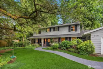 Privat front yard serenitiy. The kids can play for miles on this 1/3 acre lot with meandering paths and velvety carpetlike grass!