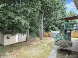 Backyard with large storage sheds
