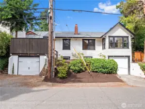 Upstairs unit garage to the back, downstairs unit garage toward the front