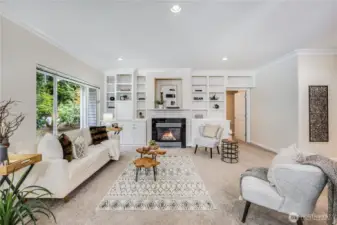 With fresh interior paint and all new carpet throughout, the home is move-in ready! Cozy up here with friends in front of the gas fireplace.