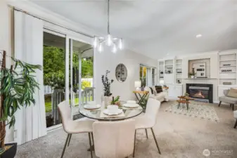 The dining area can fit a generously sized table and chairs for entertaining. Lighting it from above is a brand-new chandelier!