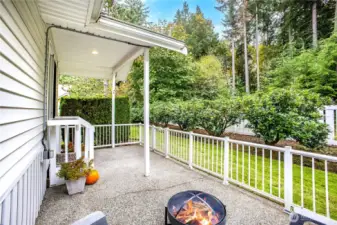 The fence and gate around the patio enable small dogs and children to stay safely enclosed in the space.