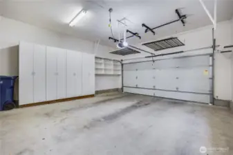 The two-car garage is ready for all your storage needs! Four sets of full height cupboards offer easily accessible storage. An extra feature: The raised storage racks above the garage’s vehicle door provide additional room for bins, holiday storage, and boxes!