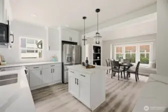 This amazing kitchen opens right up to the dining room. Kitchen is equipped with all stainless steel appliances.