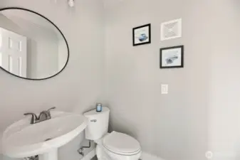 This half bath is conveniently located on the first floor right off the great room.