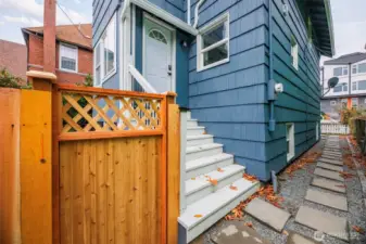 Back door to the home. Enter the gate to get to the private entrance to the basement.