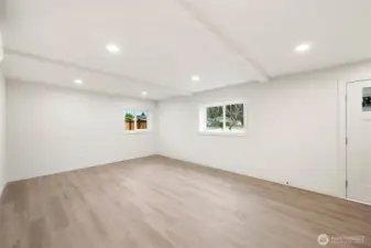 The downstairs living room is big enough for an office area