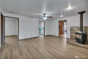 view from family room with access to large extra finished room/ bedroom/ laundry room & 3/4 bathroom.