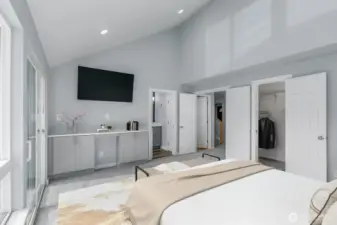 Primary on main floor has private access to pool, hot tub, and covered patio.