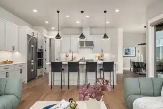 Hallway on the Left Leads to MudRoom and Guest Room with En Suite