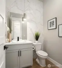 Main Floor Powder Room w/Floor to Ceiling Tile Accent
