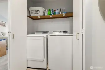 Upstairs full sized laundry closet.