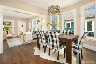 Dining room with bay window overlooking patio.