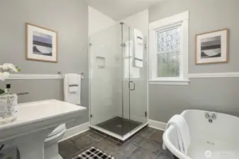 Remodeled bath with soaking tub and separate shower.