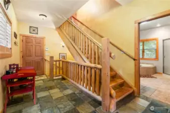 Main level view of hand honed log staircases