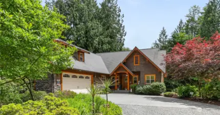 Front view of home - Traditional architectural design, English cottage stone & timber.