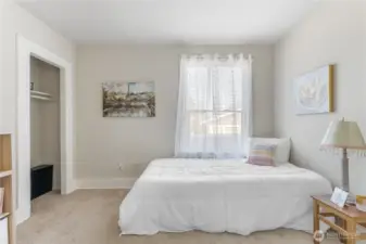 Bedroom 2 located on the upper level closer to the fireplace