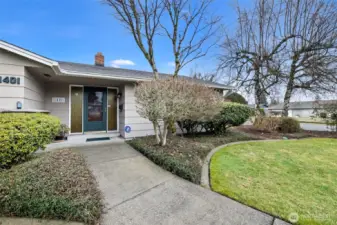 Set on a corner lot to maximize parking needs and gardening designs.