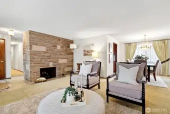 This fireplace serves both the Living and Family Rooms, wood on this side, gas on the other.