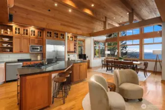 Stunning chef's kitchen - want for nothing with oversized island, Viking gas range & ovens, SubZero fridge, wine cooler & custom built-ins.