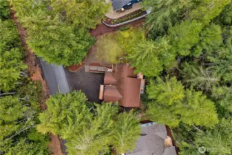 This is the aerial view of the home. To the one side is a level area which makes a great yard space.