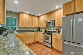 So much storage!! Now you can really see the custom hickory cabinets---stunning!