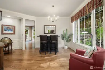 Fun use of the full size dining room. Notice the beautiful white oak hardwood floors.