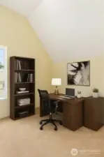 The 3rd bedroom is upstairs and is virtually staged as an office.  This makes a delightful work environment with lots of natural light, vaulted ceilings and another large walk-in closet.