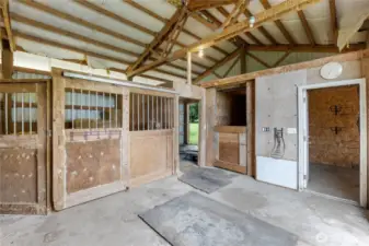 Interior of 4-stall barn and tack room.