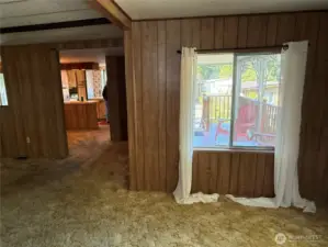 This angle from the family room faces the dining room through to the kitchen.