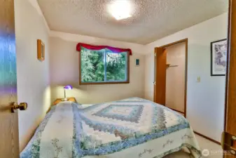 Bedroom 1 with lighted closet.