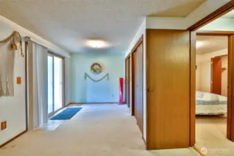 Primary Bedroom leading out to the Sun Room.