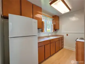Kitchen space, appliances as seen convey with sale.