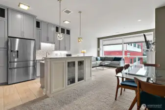 The kitchen is equipped with stainless steel appliances, quartz countertops and soft close cabinetry and tile flooring. All appliances remain with the sale of the condo.