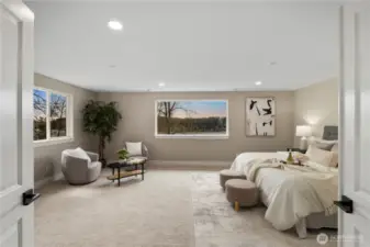 Spacious primary bedroom upstairs with views of Lake Washington.