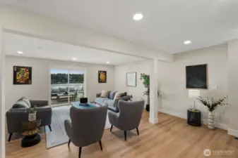 Downstairs living room with access to spacious deck.