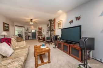 living room with wood stove