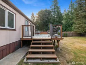 Rear deck overlooking the private backyard.