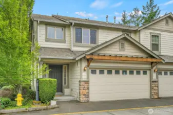 Front of Condo w/ Attached 2 Car Garage