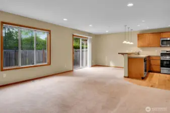 Living Room View to Dining Room and Kitchen