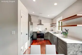The kitchen, bathed in sunlight, is both functional and inspiring.