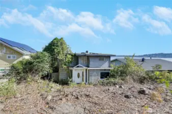 Another view of the old house, highest and best use is to remove and put your dream home there.
