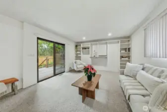 Sweet deck opens to the fully fenced back yard.