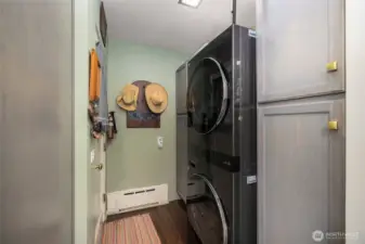 The laundry room has more storage and hookups for a stackable washer/dryer.